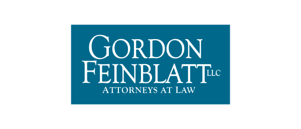 A blue rectangular logo featuring the text "Gordon Feinblatt LLC" in large white letters, with "Attorneys at Law" in smaller white letters below. The background is solid blue