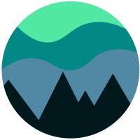 A circular graphic featuring layered abstract shapes representing hills and mountains in varying shades of green and blue. The design has a smooth, modern aesthetic